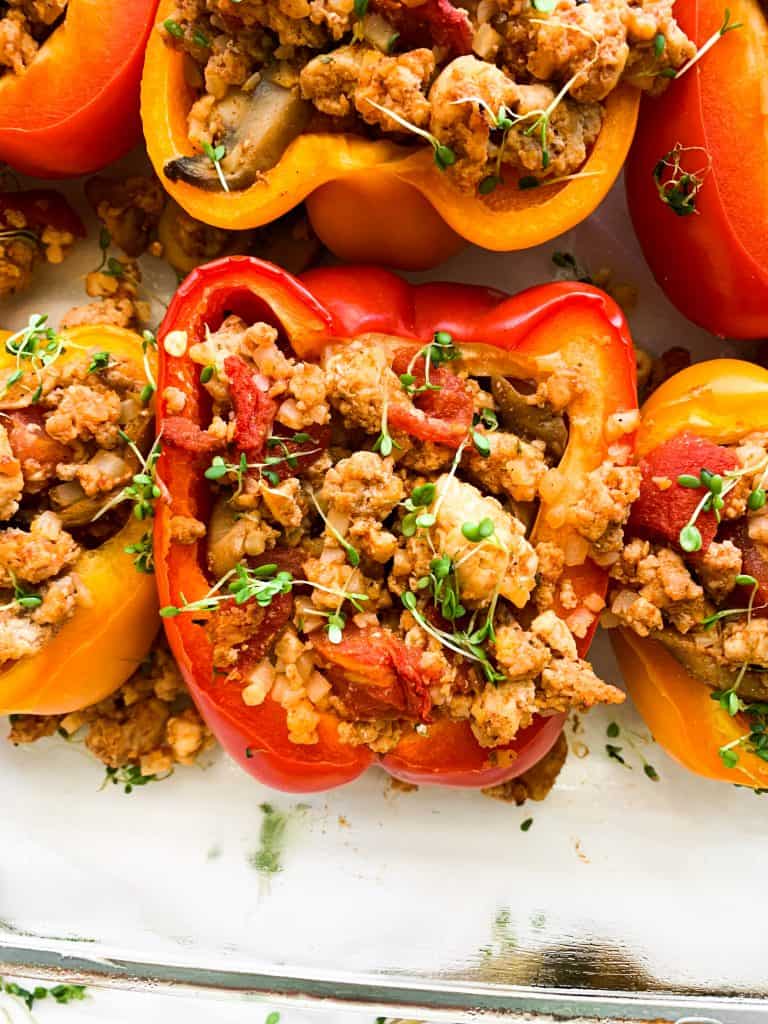 Whole30 Stuffed Peppers with ground turkey, mushrooms, tomatoes, and spices.