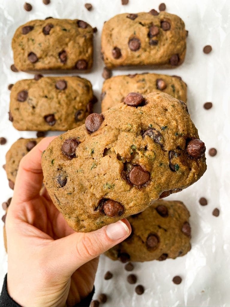 Healthy Whole Wheat Zucchini Bread with Chocolate Chips is fluffy, moist, and sneaks in some added fiber and nutrients thanks to the shredded zucchini. Made with good-for-you ingredients like coconut sugar and whole wheat flour. #wholewheat #zucchinibread #healthyrecipes #healthybaking #healthy #wholewheatzucchinibread #healthyrecipe Healthy Whole Wheat Zucchini Bread