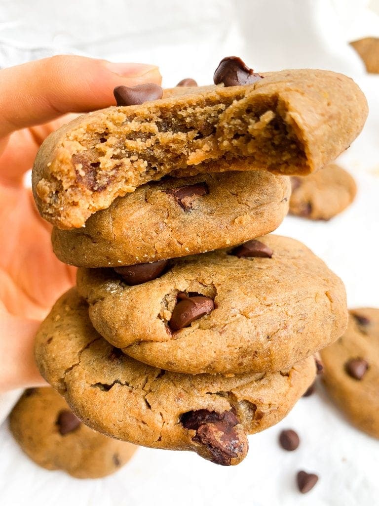 Holding a stack of protein chocolate chip cookies after baking