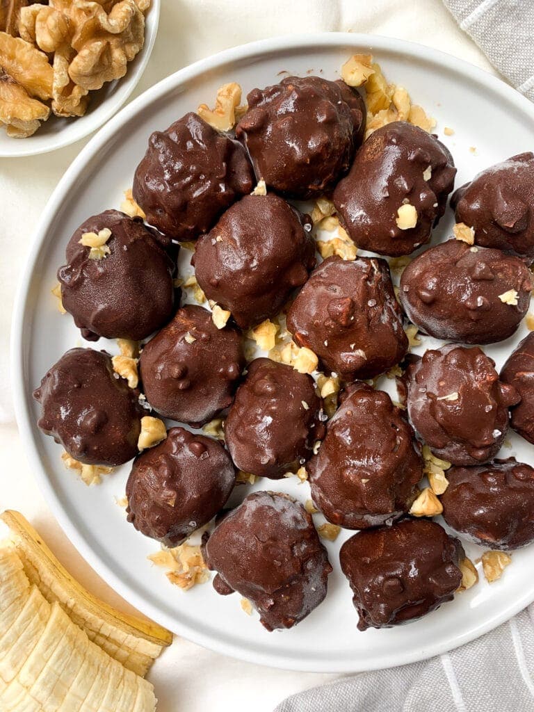 Plate of Vegan Ice Cream Balls Dipped in Chocolate