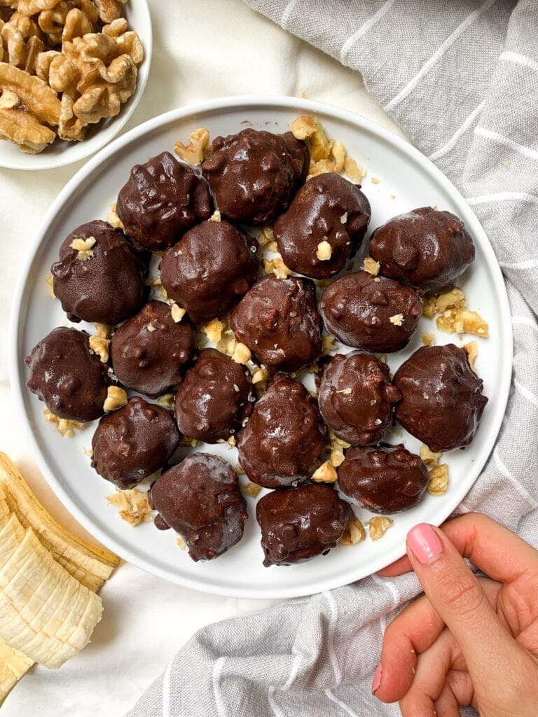 Plate of Vegan Ice Cream Balls Dipped in Chocolate