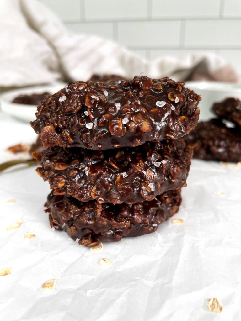three no back cookies stacked on top of each other on wax paper