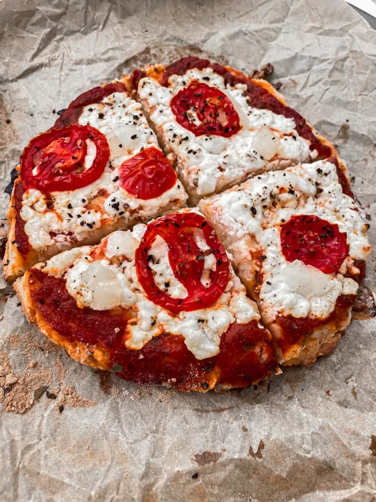 Personal high protein pizza cut into 4 squares. 