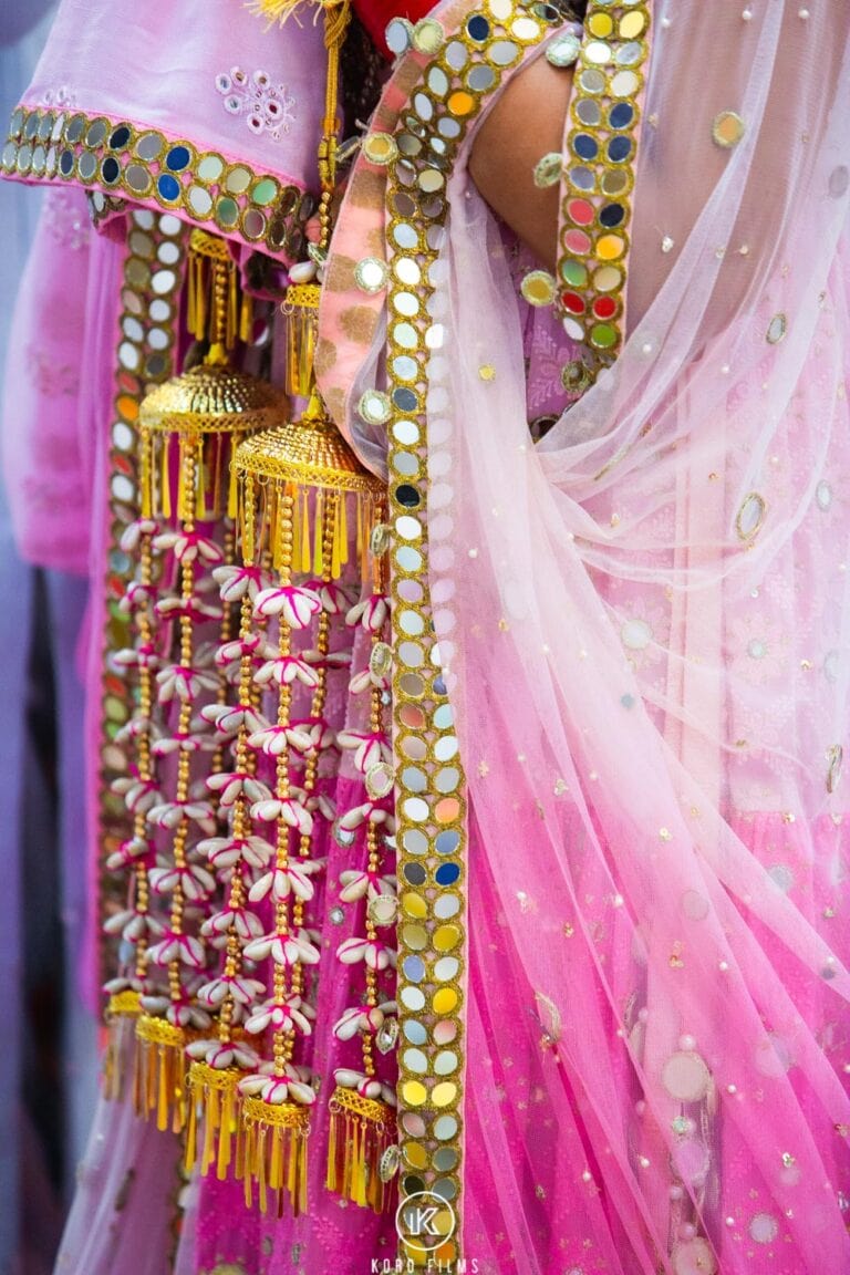 Golden kaleere hanging from a Sikh bride’s chooda bangles