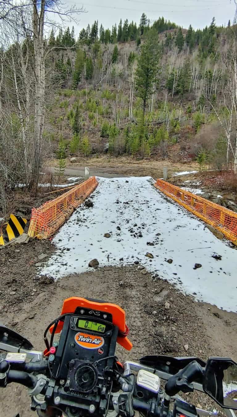 motorcycle crossing sketchy bridge