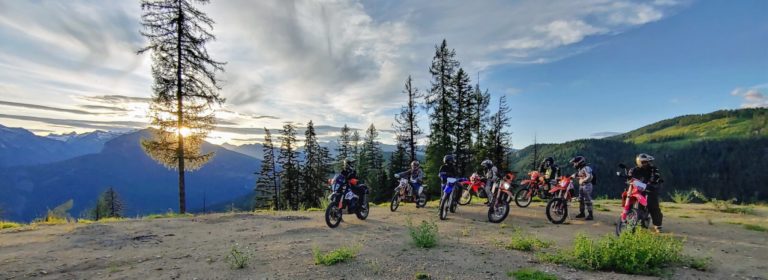 motorcycle riders look over Slocan valley