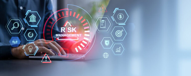 A person is using a computer to manage their risk.