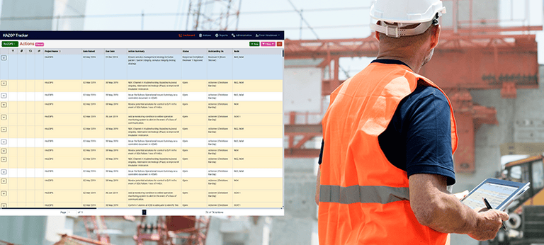 Screenshot of the HAZOP Action Tracker software overlaying a photo of a man in a hard hat working on a building site.