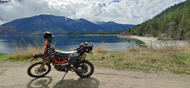 motorcycle in front of kootenay lake