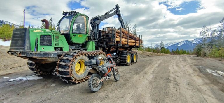 huge tracked logging truck