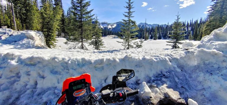 motorcycle in snowstorm Kootenay pass summit
