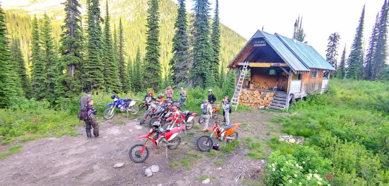 motorcycle riders in front of Crusader Cabin