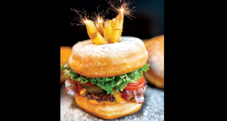 Toronto gourmet burger chain is giving away $10k to give away and FREE BURGERS FOR A YEAR