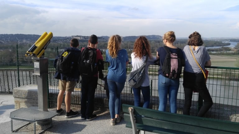 Group of ACIS students looking at a scenic view