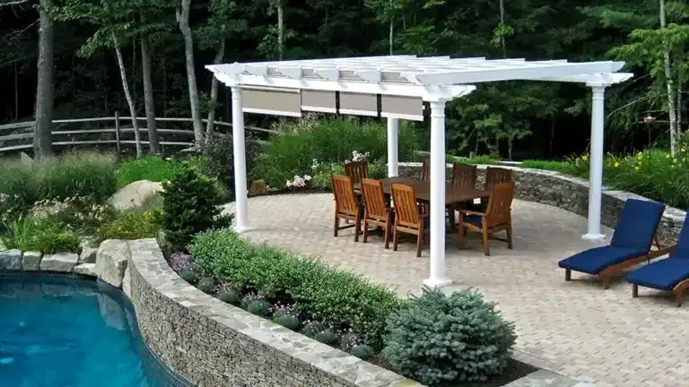Vista Vinyl Pergola with ShadeFlex Outdoor Canopies Poolside