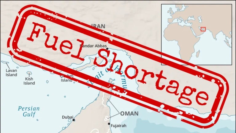 Map of the Strait of Hormuz between Iran and Oman with nearby locations like Dubai labeled. A large red stamp reads "Fuel Shortage" across the map, highlighting disruption to oil transit and a jet fuel shortage linked to the Iran conflict.