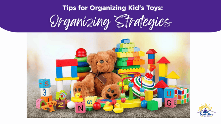 Colorful children's toys including a teddy bear, building blocks, rubber ducks, and stacking rings arranged on a grey surface for organizing kids' toys.