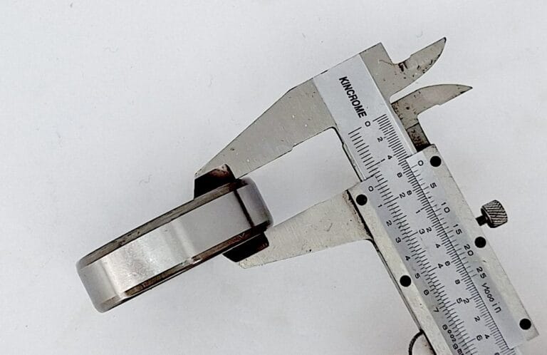 measuring width of a bearing with a vernier caliper