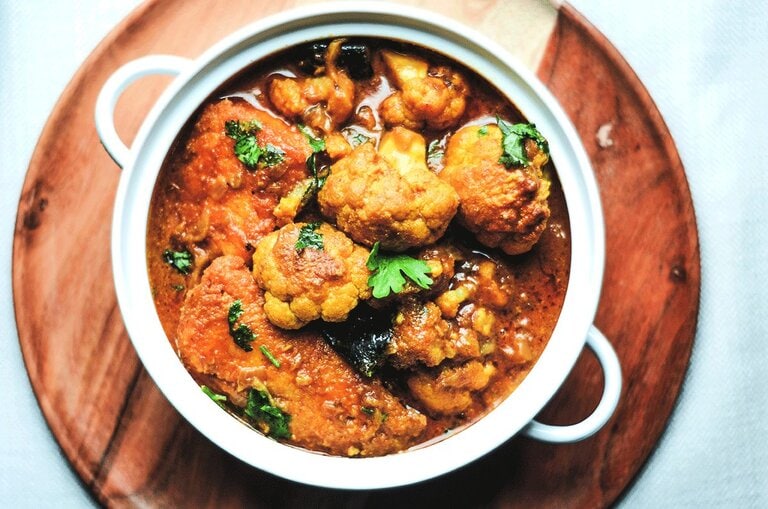 Bengali style fish curry with cauliflower and eggplant