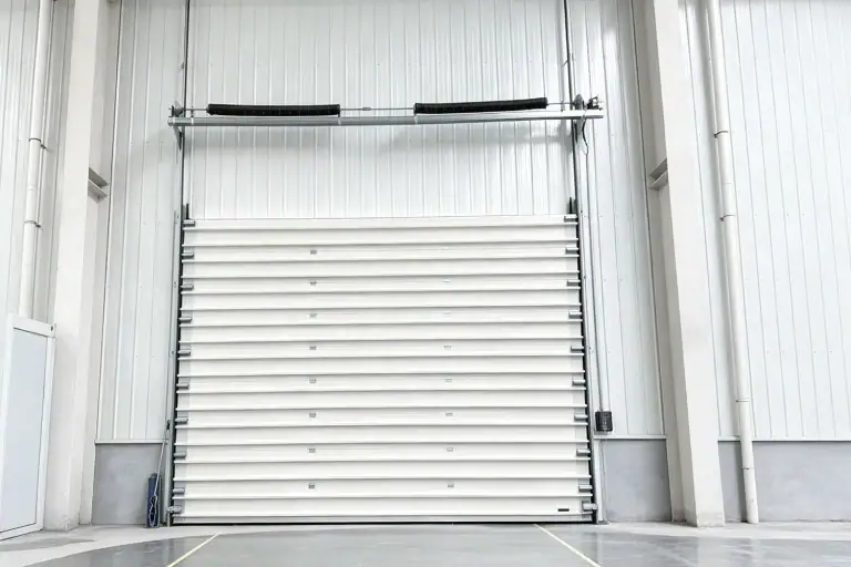 How to Avoid Panel Delamination and Spring Failure in Sectional Doors - Engineering Guide for Industrial Warehouses