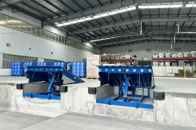 Heavy-duty industrial hydraulic dock leveler installed in a warehouse loading bay for cost-efficiency evaluation