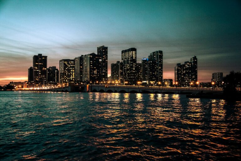 Brickell Miami skyline reflected on the water at night