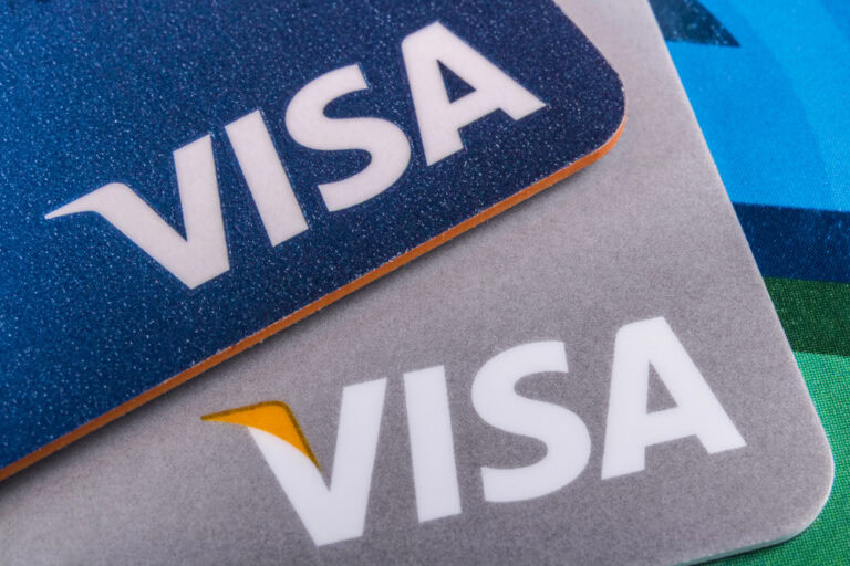 Two credit cards displaying the VISA logo