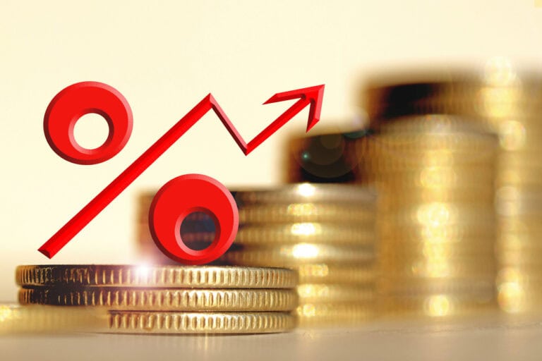 Red percent sign on a background of money