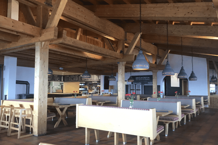 Restaurant setting with tables and high chairs