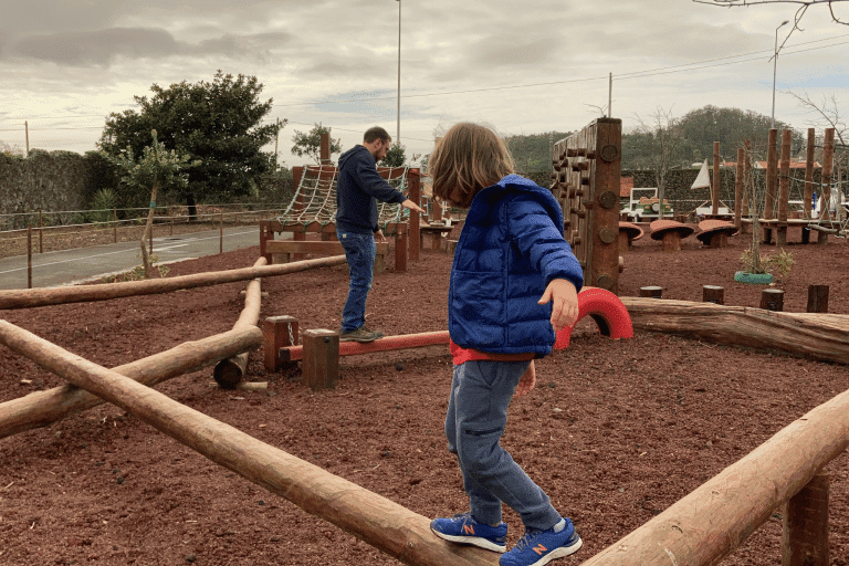 Child and dad on playground practicing kids safety tips shared by gowhee