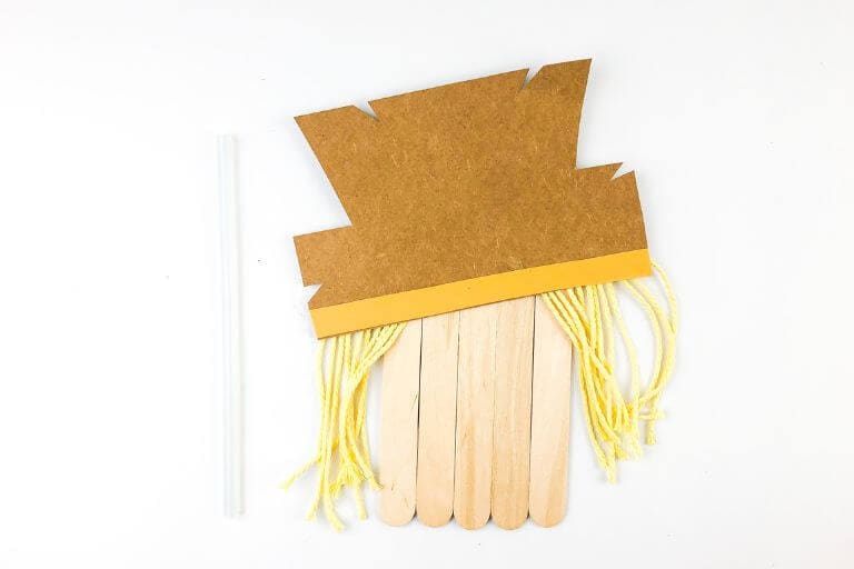 gluing scarecrow craft