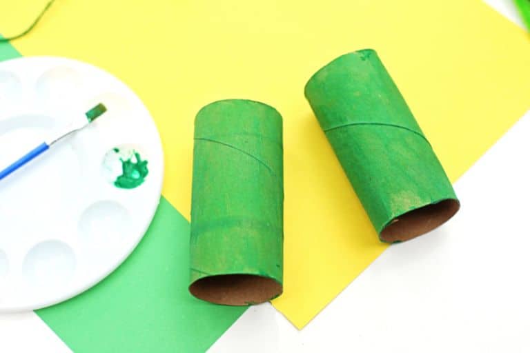 green painted toilet paper rolls.
