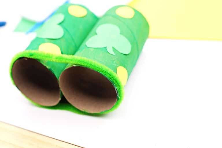 attach the pipe cleaner to your binoculars