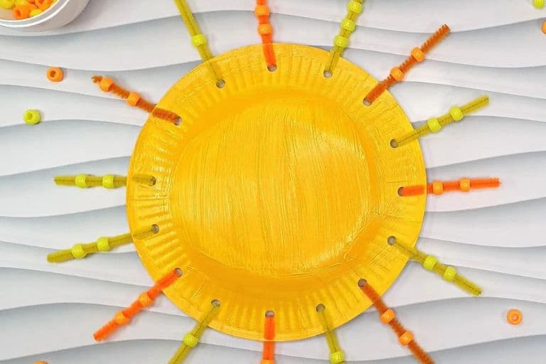 yellow paper plate sun craft with beads