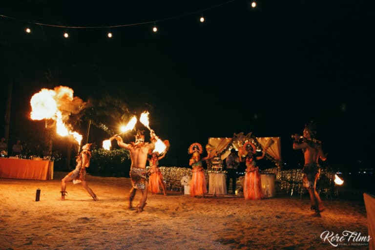 Fire dancers perform on the beach during the wedding reception at Cape Dara Resort, Pattaya