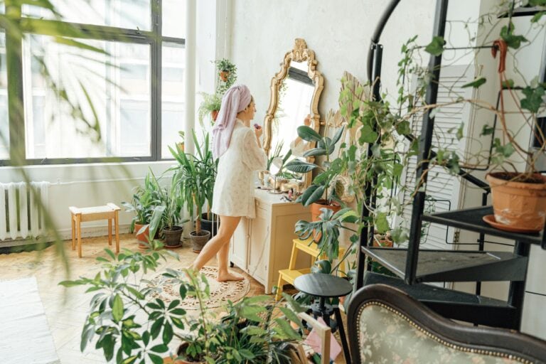 Woman surrounded by Houseplants