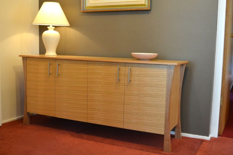 Tassie Oak Sideboard. Can be made with draws, doors or a combination of both. Made with clean and contemporary look with its curved legs and straight line it will made a fine addition to any room. Custom made timber furniture. Custom made furniture and furniture maker.