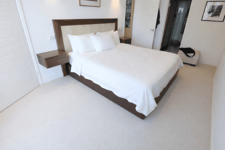 Custom made bed for a client in the CBD. Built from beautiful walnut timber with Sycamore and stringing inlay details in the bedhead. This custom made bed is where luxury meets everyday living. The rich, warm tones of the walnut create this gorgeous focal point in the bedroom, with those intricate inlay details.