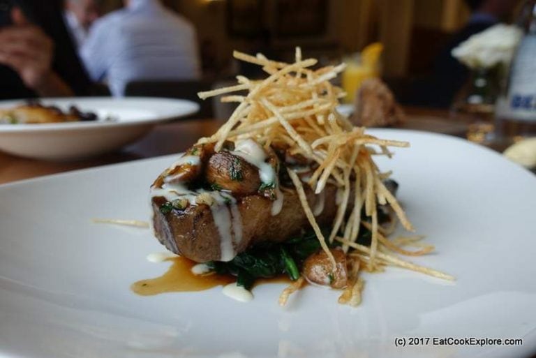Roasted Sirloin of Beef with mushroom persillade, spinach, straw potato and red wine