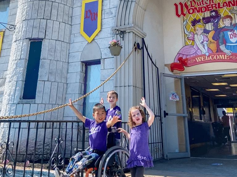 Kids excited in front of Dutch Wonderland in Pennyslvania