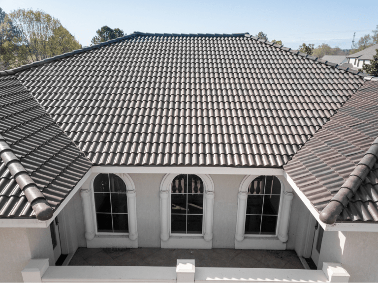 Front view of house with grey tile roof.