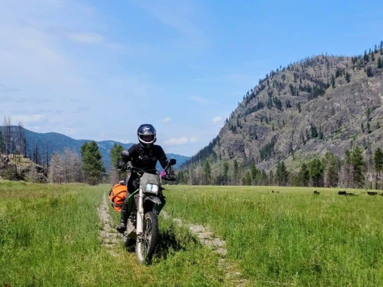 a picture of a motorcycle rider on the railbed near rock creek
