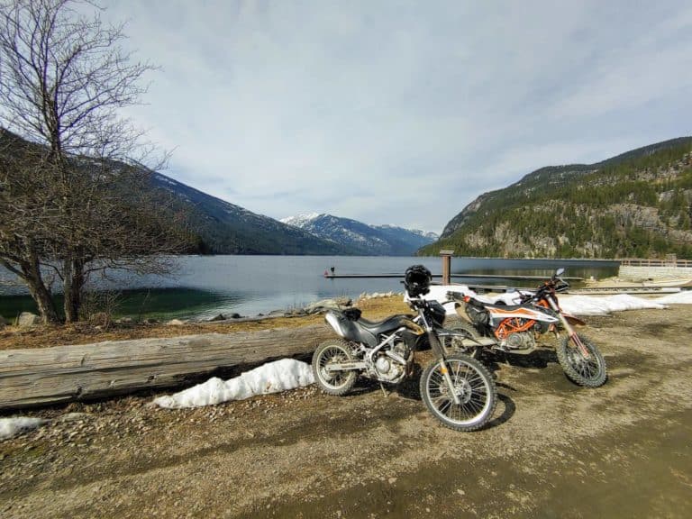 motorcycles in front of Slocan Lake