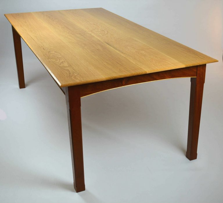 Custom made timber furniture. Custom made furniture and furniture maker. Made with curved rails with cock beading and inlayed top details. Tapped legs and top give an elegant look for a modern feel with old world-built details.