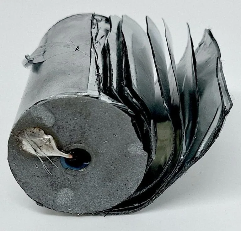 Dielectric layers of a capacitor after the outer case is removed