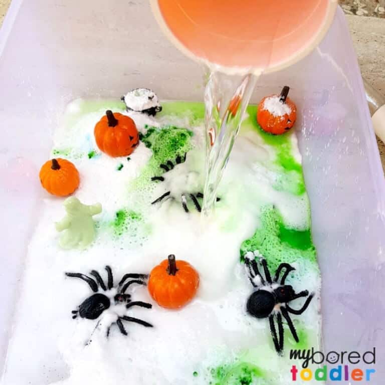 Fizzing science sensory bin experiment for Halloween