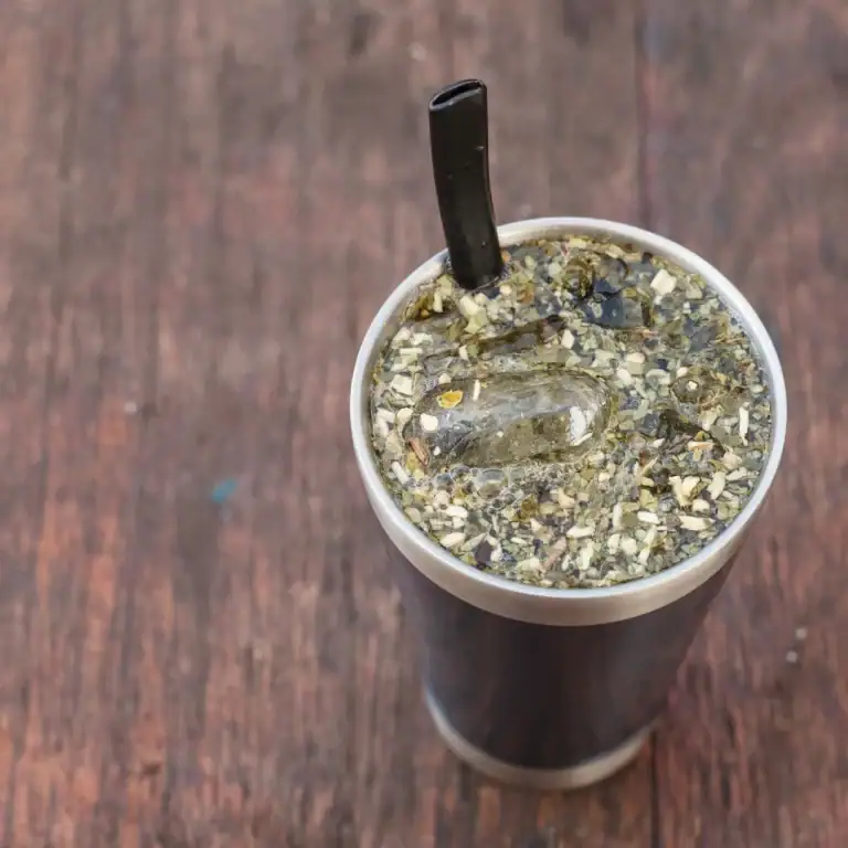 Traditional Paraguayan Tereré setup with yerba mate leaves