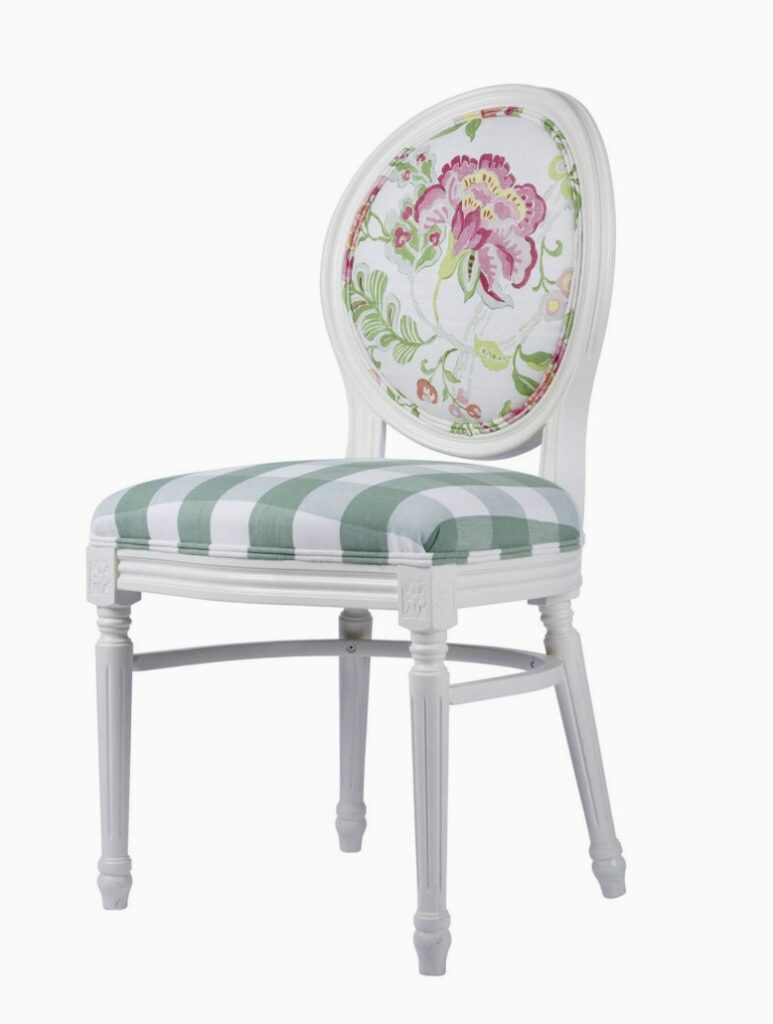 Elegant upcycled dining chair with green striped seat and floral embroidered backrest, styled in an antique French design for formal dining spaces
