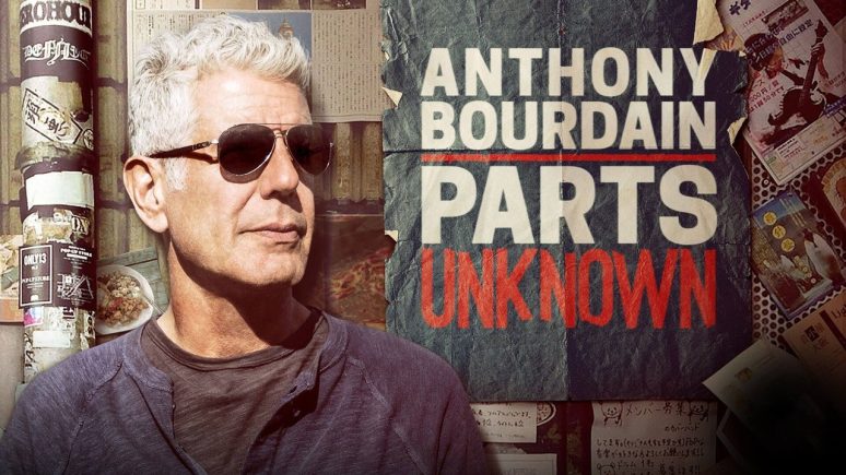 A scene reminiscent of Anthony Bourdain: Parts Unknown, featuring a traveler engaging deeply with local culture and cuisine for inspiration.
