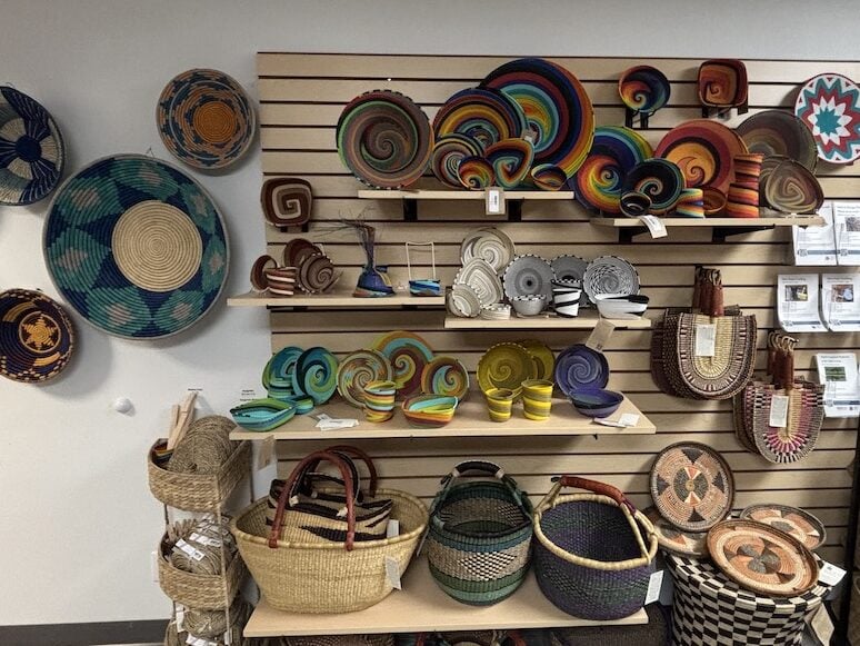 Shelves of African baskets in multiple colors